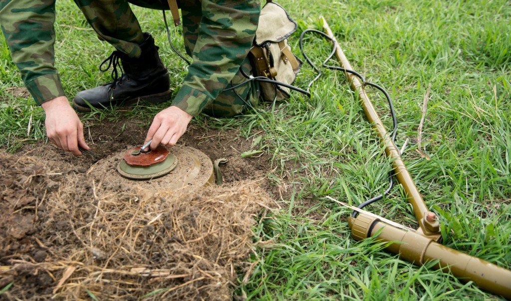 Land Mine Detected and Uncovered (Photo Credit: kanzefar / fotolia)