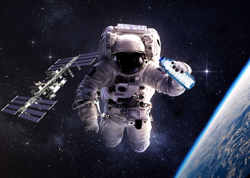 Astronaut & water bottle in space