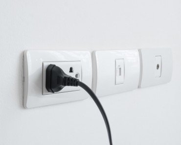 Plug plugged in a wall socket