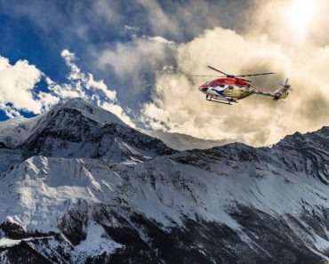 Helicopter landing on a mountain