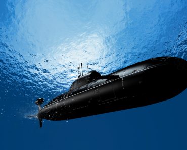 The military ship in the sea submarine