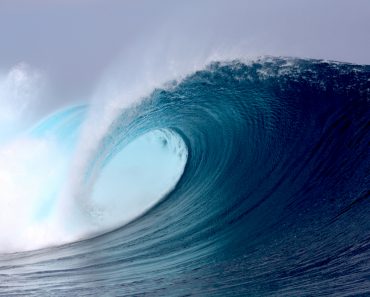 Tropical blue surfing wave ocean sea