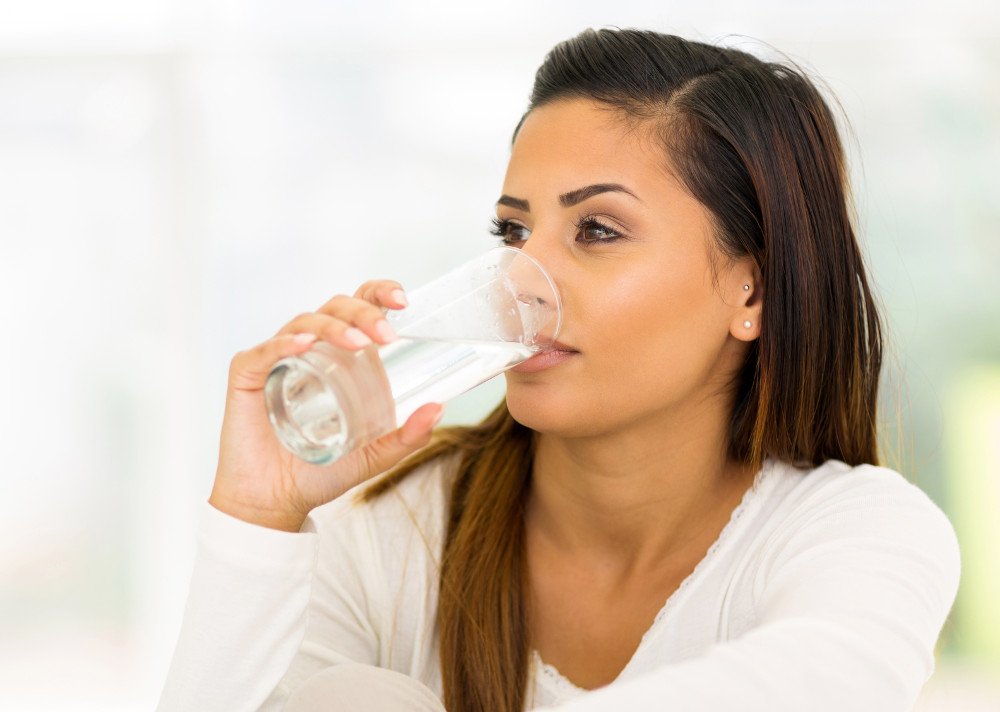 Drinking water woman