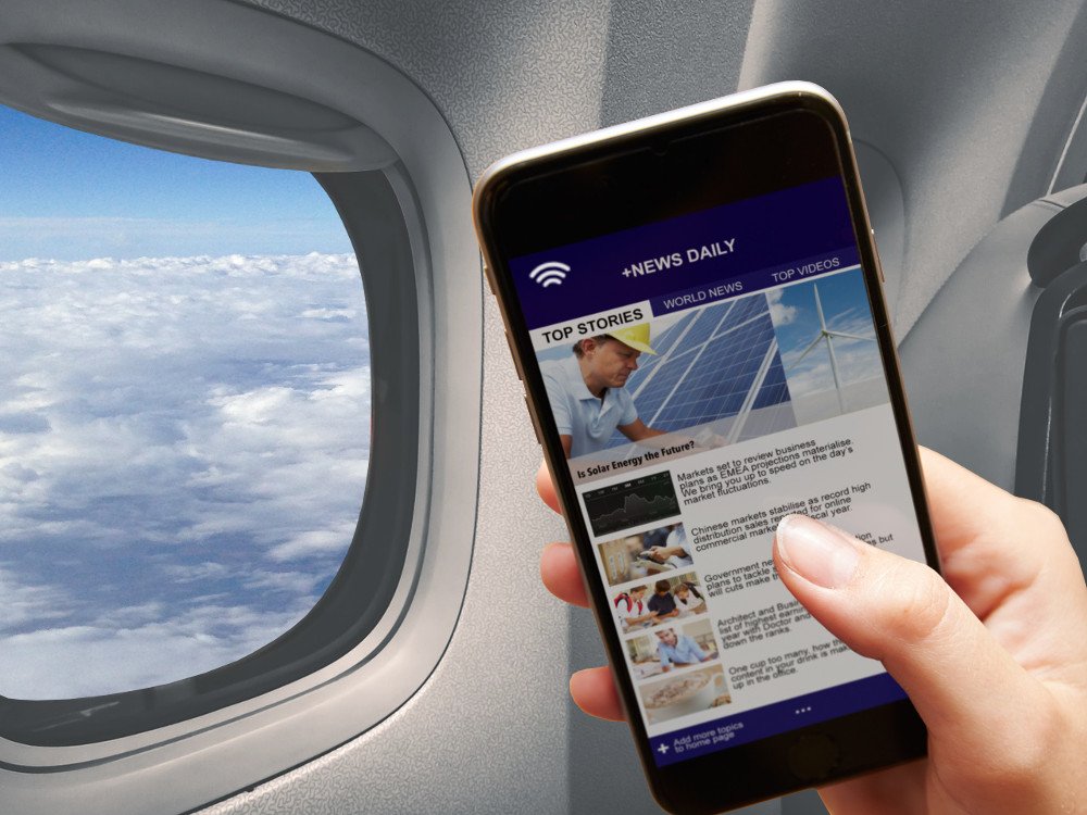 Mobile in girl hand reading news connected to the airplane wifi window cloud flying