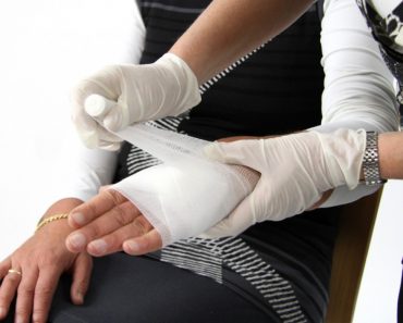 Dressing injured hand medicine health care hospital bandage