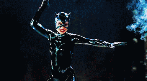 Catwoman snapping her whip