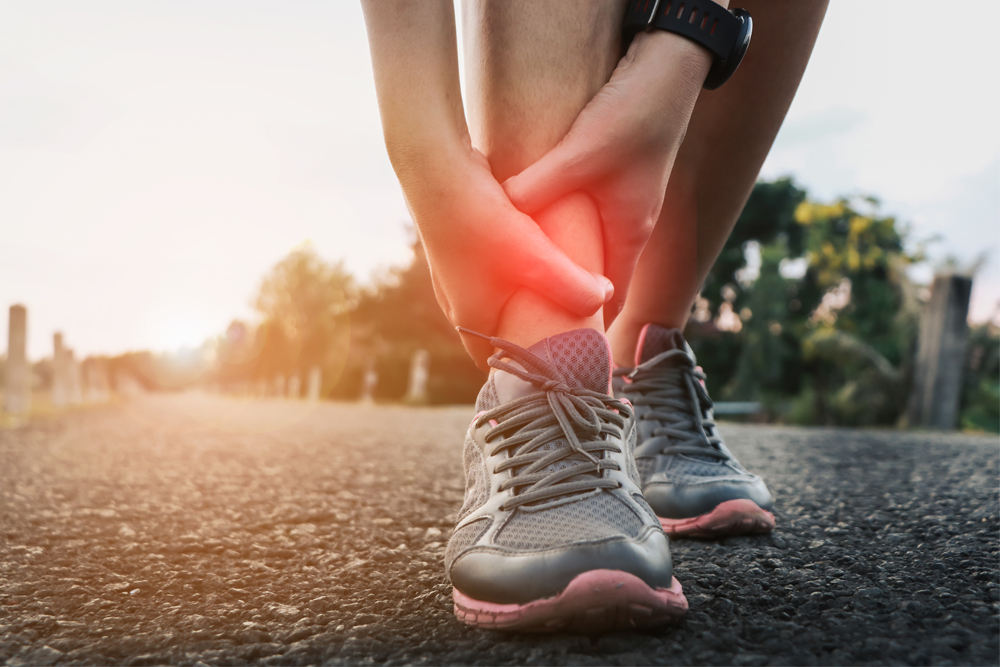 Ankle twist sprain accident in sport exercise running jogging.sprain or cramp Overtrained injured person when training exercising or running outdoors. - Image(By mansong suttakarn)s