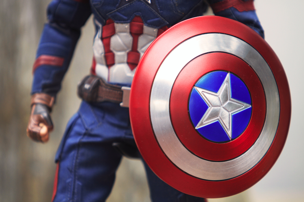BANGKOK THAILAND - JUNE 17 ,2018 Close up shot of Shield for Captain America Civil War superheros figure in action fighting. Captain america appearing in American comic books by Marvel. - Image(phol_66)s
