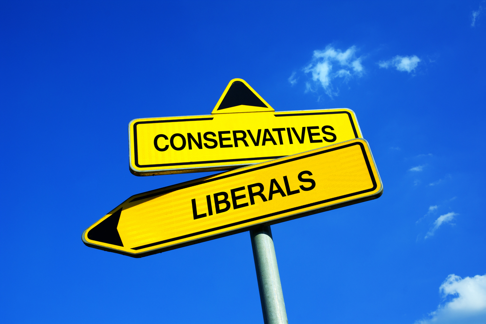 Conservatives vs Liberals - Traffic sign with two options - political preference of elector during elections( M-SUR)s