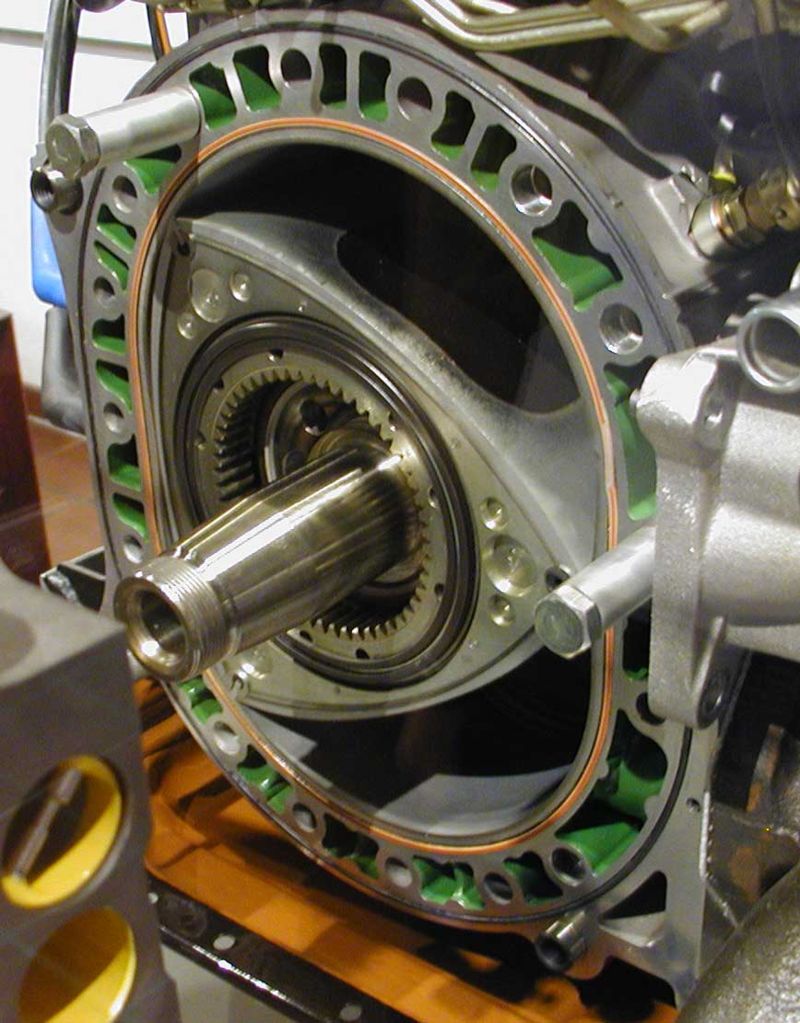 A Wankel engine with its rotor and geared output shaft clearly shown.