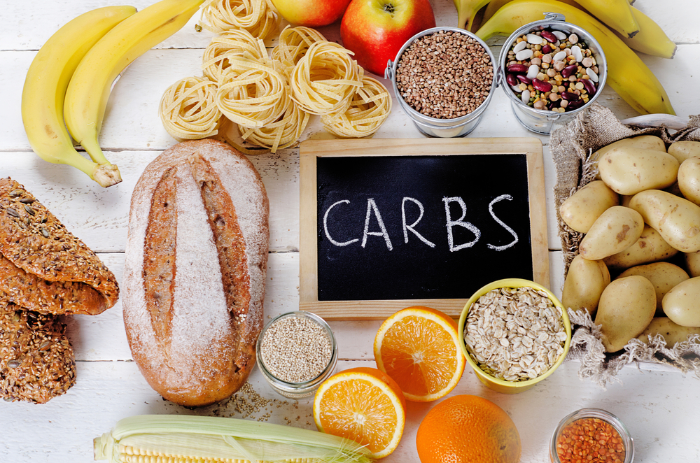 Best Sources of Carbs on a white wooden background. Top view - Image(bitt24)s