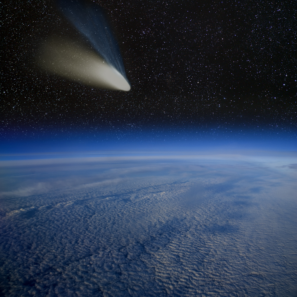 Comet impact. Comet Hale-Bopp above the Earth's surface. - Image(MarcelClemens)s