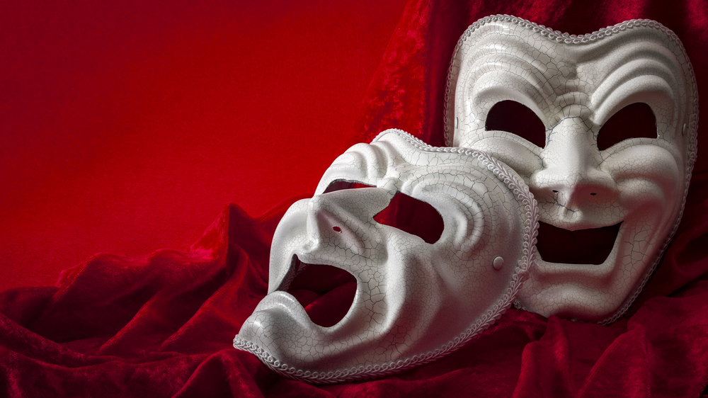 Theatre and opera concept with theatrical masks on red velvet( Victor Moussa)S