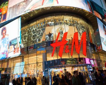 Times Square H&M store at night. H & M Hennes & Mauritz AB is a Swedish multinational retail-clothing company(Sorbis)s