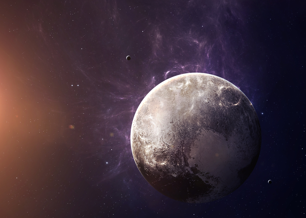 The Pluto with moons shot from space showing all they beauty( Vadim Sadovski)s