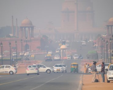 Vehicles moving in the road amidst heavy smog(Saurav022)s