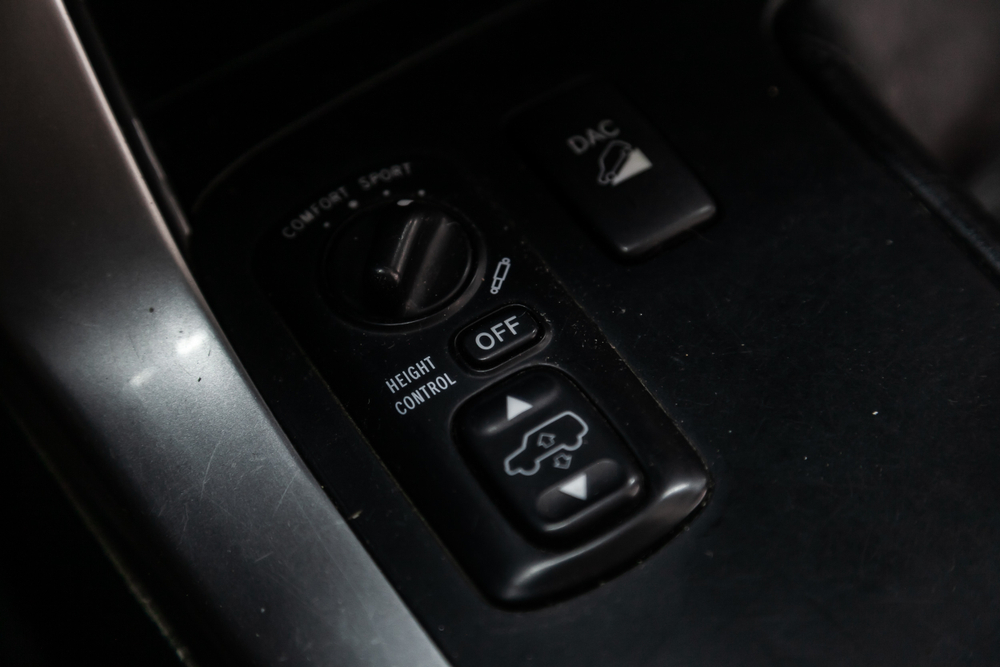 Close-up off road suspension control buttons. modern car interior( Everyonephoto Studio)s