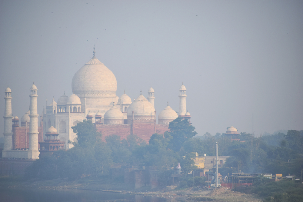 aj Mahal through Smog air pollution in India, impact of air pollution on Taj Mahal(DevilsAdvocate)s