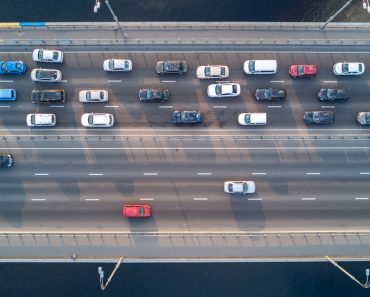Aerial top view of bridge road automobile traffic of many cars(JaySi)S