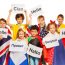 Kids holding greeting signs in different languages(Sergey Novikov)s