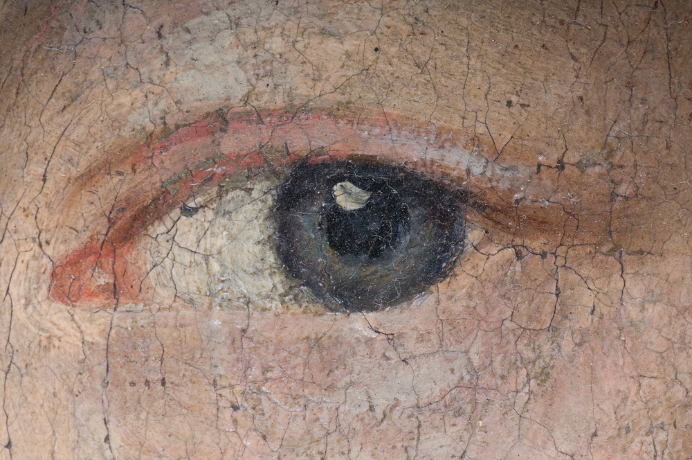 Detail of a woman's eye on an old baroque oil painting(stoupa)s
