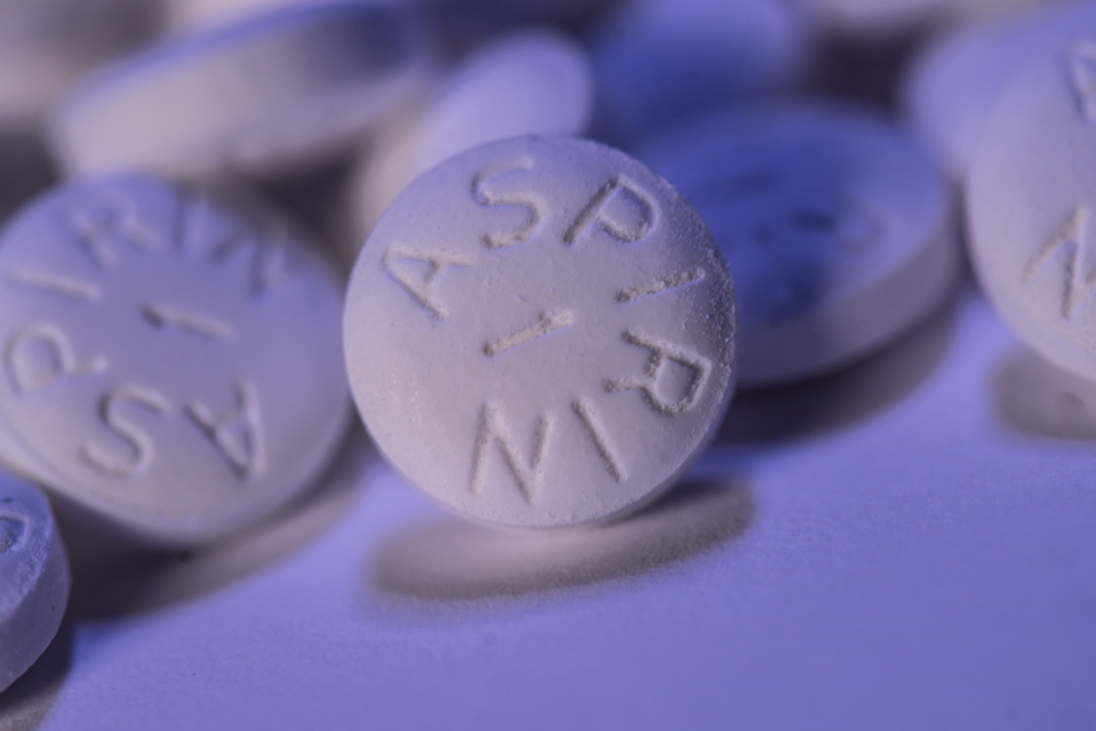 White Aspirin macro shot on blue background(Shane Maritch)s