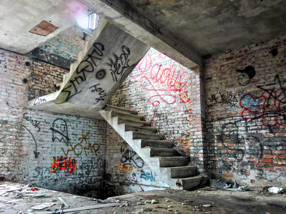 Creepy crumbling staircase inside abandoned building(Josh Cornish)s