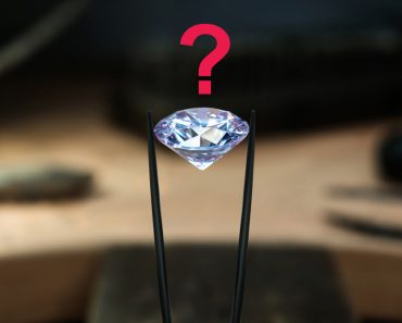 Beautiful diamond stone in tongs(Luibov Luganskaia)s