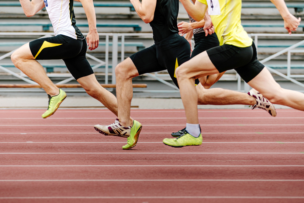 legs men athletes runners running race sprint in athletics