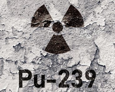 Pu 239 - radioactive Plutonium isotope sign on grunge wall