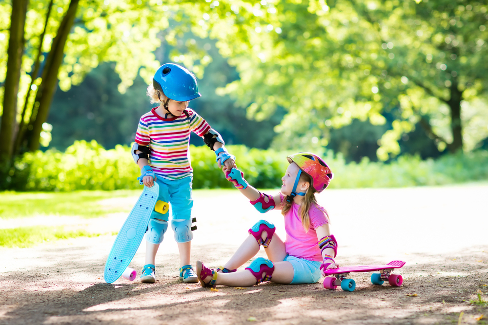 Children,Riding,Skateboard,In,Summer,Park.,Little,Girl,And,Boy