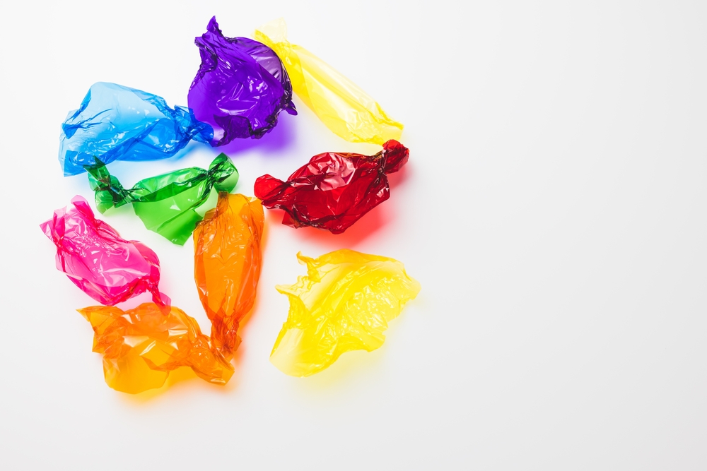 Colorful,Candy,Wrappers,On,White,Background,,Copy,Space