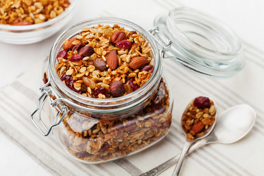 Homemade,Granola,In,Jar,On,White,Table,,Healthy,Breakfast,Of