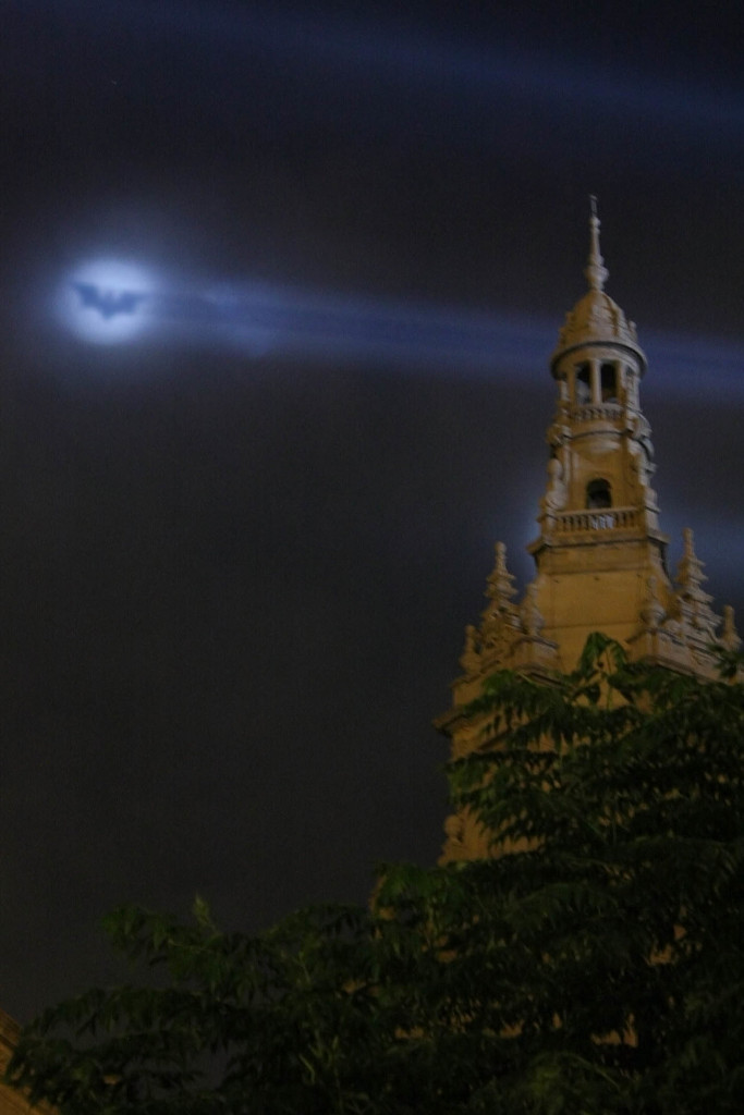 The Bat-signal projected in the night sky