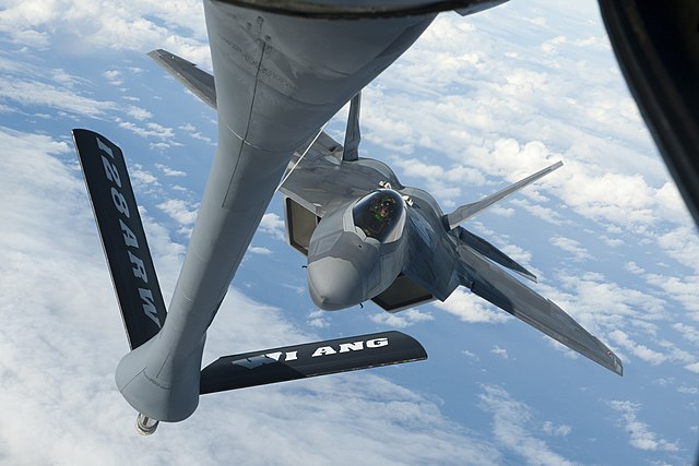 A Hawaii Air National Guard F-22 Raptor approaches a Wisconsin ANG KC-135 Stratotanker to receive aerial refueling, Dec. 11, 2018, over the Pacific Ocean, near the Hawaiian Islands. Sentry Aloha provides tailored, cost effective and realistic combat training for U.S. Air Force, ANG and other Department of Defense services to provide warfighters with the skill sets necessary to perform their homeland defense and overseas combat missions. (U.S. Air National Guard photo by Senior Airman John Linzmeier)