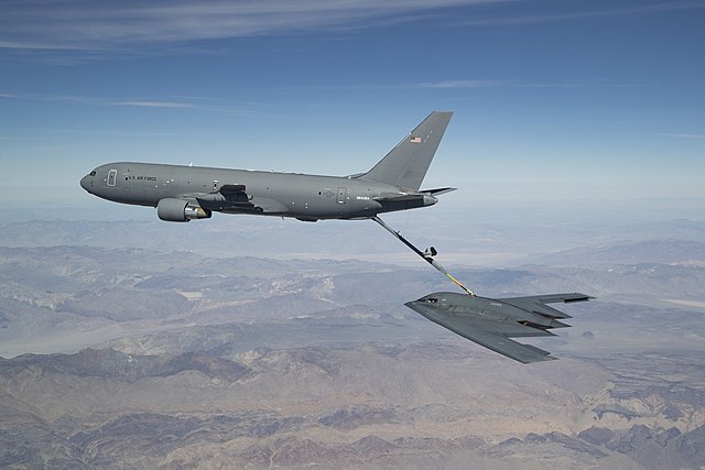 EDWARDS AIR FORCE BASE, Calif. --KC-46 refuels the B-2 for the first time during developmental flight test over Edwards AFB and the Sierra Nevada Mountains on Apr. 23, 2019. (U.S. Air Force photo by Christian Turner)