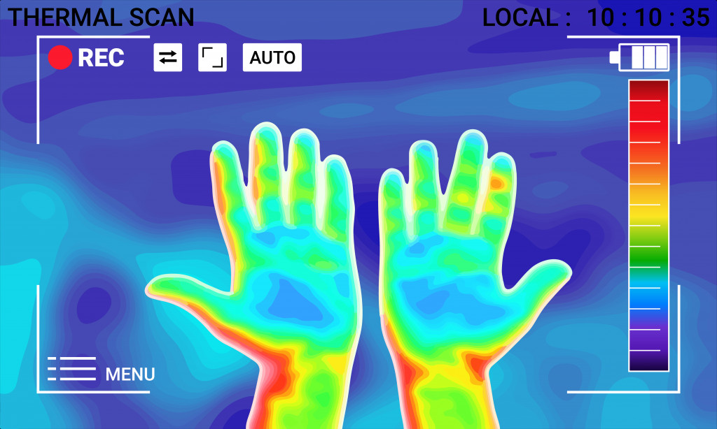 Ilustración vectorial gráfico de la imagen térmica Escaneo de las manos y el dedo sobre fondo borroso. Espectro electromagnético.