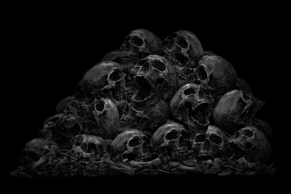 Pile,Of,Skull,And,Bone,,On,Black,Background,,Scary,Crime