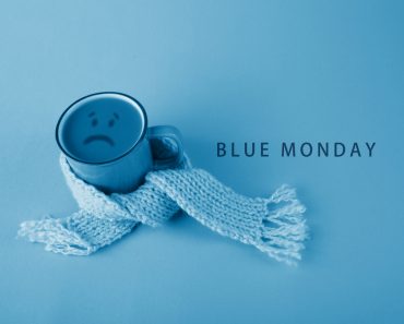 Blue,Cup,With,Scarfcoffee,On,Blue,Background.,Blue,Monday,Concept