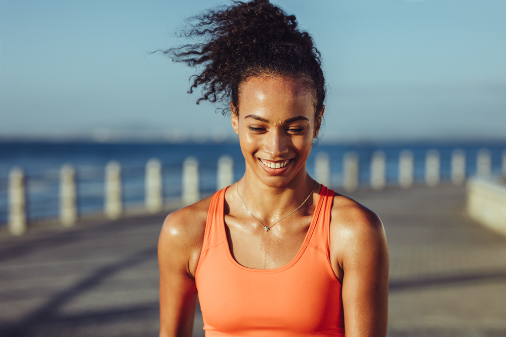Smiling,Young,Female,Runner,Taking,A,Breather.,Healthy,Young,Woman